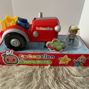 Cocomelon musical tractor with figurine,new in box, plays oOld McDonald song